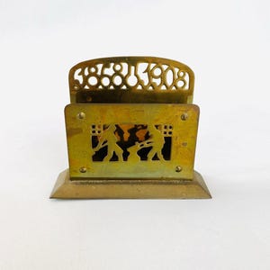 Porte-lettres en laiton antique – Cheminées Jaarsma 40e anniversaire 1868-1908
