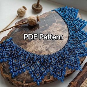 May include: A beaded necklace featuring a geometric diamond pattern in vibrant blue and black glass beads with a pointed, scalloped edge. The text PDF Pattern is centred over the necklace, which is displayed on a polished wooden slice.