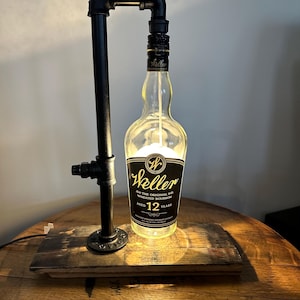 Weller Bourbon/ Whiskey bottle pipe lamps with barrel stave base.