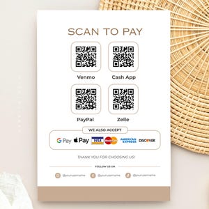 May include: A vertical sign with the text "SCAN TO PAY" at the top, featuring QR codes for Venmo, Cash App, PayPal, and Zelle. It also lists accepted payment methods like Google Pay, Apple Pay, Visa, Mastercard, American Express, and Discover.