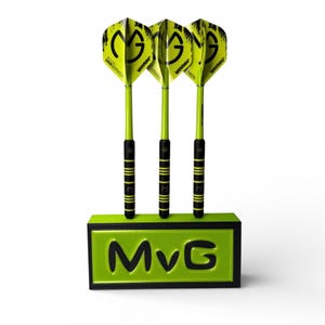 May include: Three darts with neon green shafts and black and gold striped handles are displayed in a neon green and black holder. The dart flights are neon green with a black graphic and the text "Winmau" and "Van Gerwen". The holder has the text "MvG".
