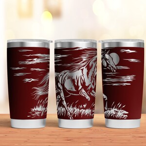 May include: Three stainless steel tumblers with a red exterior and a silver lid. Each tumbler features a laser-etched design of a horse running through a field with a moon in the background.