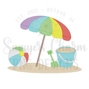 May include: A colorful beach umbrella, a beach ball, a blue bucket, and a green shovel on a sandy beach. The text "EST. 2021 - DOTHAN, AL" is above the umbrella.