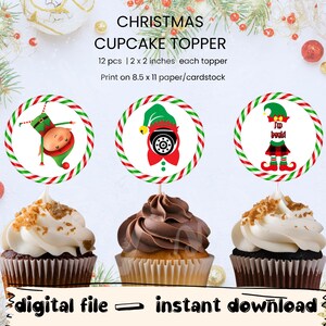 Puede incluir: Adornos para cupcakes navideños con diseños festivos. Cada adorno mide 5,08 x 5,08 cm y presenta gráficos de elfos y temáticos de vacaciones. La imagen incluye el texto "archivo digital - descarga instantánea".