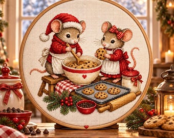 May include: A circular embroidery hoop containing a cross-stitch design of two mice wearing red clothing and white aprons, baking cookies. One mouse wears a Santa hat, while the other has a red bow. They are surrounded by a mixing bowl, a baking sheet, and holly.