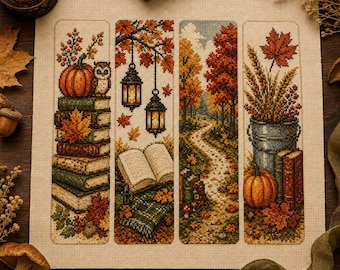May include: A cross-stitch embroidery featuring four vertical panels with autumn themes. The panels depict a stack of books with an owl and pumpkin, hanging lanterns over an open book, a winding forest path, and a bucket filled with wheat and leaves.