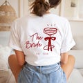 Hen Party Shirt for Women • The Bride & Bride Club • Personalized with Name and Estimated Date • Champagne Design • Hen Party T-Shirt product logo