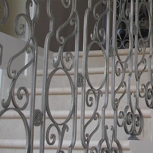 Forged balcony railings. Elegant Hand-Forged Iron Staircase Railings for Indoor Use. The price is for 1 Linear Foot.