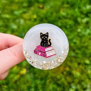 Handmade phone grip: "Witchy Kitty." Attaches to a transparent base. More styles available.