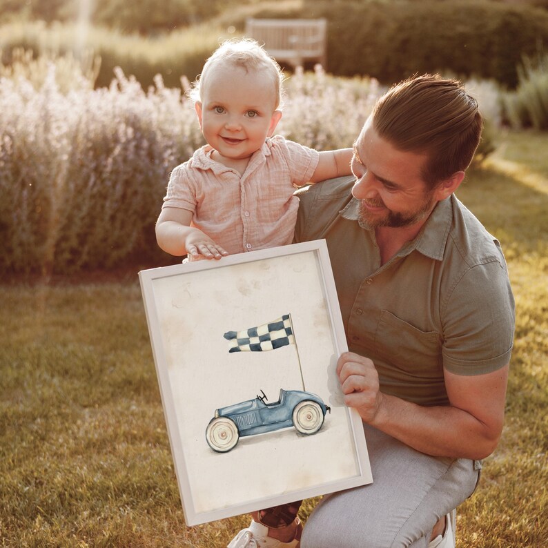 Light blue vintage race car wall art for nursery — charming watercolor illustration with a playful mood and black-and-white checkered flag backdrop.