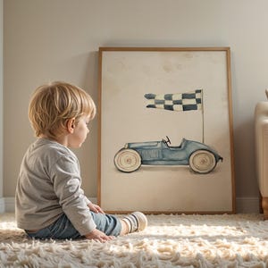 Charming race car wall decor for kids' space — soft watercolor design showcases a light blue vintage car with playful elements and gentle shading.