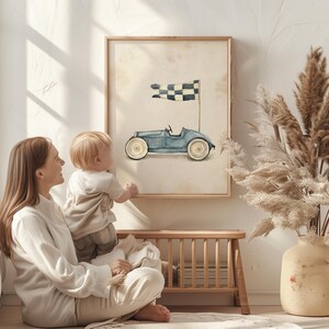 Cute racing car printable art for toddler’s area — light blue hues and clean lines create a whimsical atmosphere with a checkered flag accent.