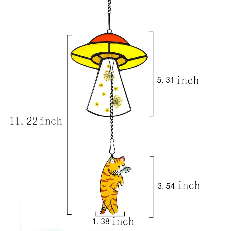May include: A stained glass UFO wind chime with a yellow and red design. The chime features a small cat holding a fish and hangs from a black chain. The UFO is 5.31 inches tall and the cat is 3.54 inches tall.