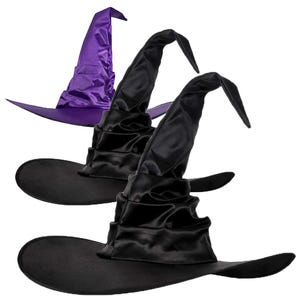 May include: Three witch hats are shown. Two are black, and one is purple. The hats have a wide brim and a tall, pointed crown. The black hats are in the foreground, and the purple hat is in the background.