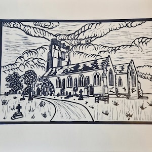 May include: A black and white linocut print of a church with a tower in the background. The church is surrounded by trees and a path.