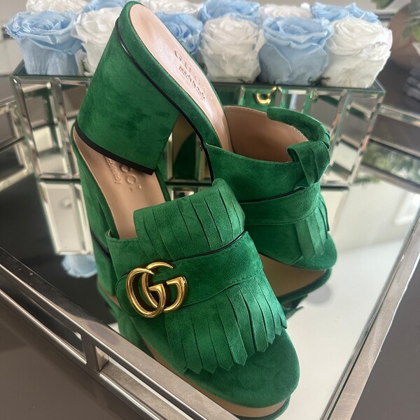 Gucci Marmont suede heels. Brand new beautiful emerald green color. Double brass GG, suede fringe. Never worn. I no longer have the box.