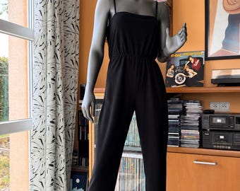 Mono negro vintage de Clobber of London de los años 70.