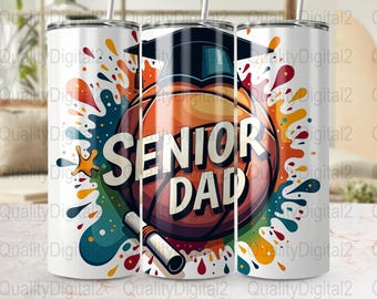 May include: White tumbler with a colorful design featuring a basketball with a graduation cap on top. The basketball has the words "Senior Dad" written on it.