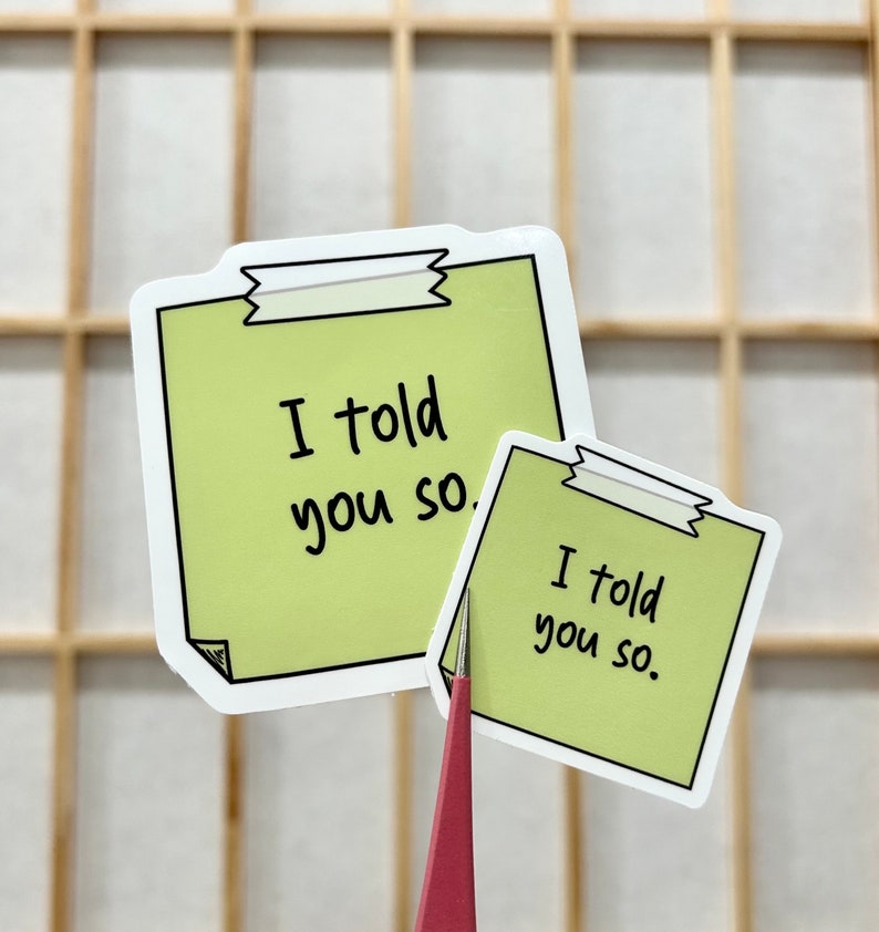 May include: Two green sticky note stickers with the text "I told you so" written in black marker.
