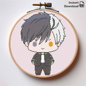 Peut inclure: Une broderie au point de croix dans un cercle en bois représente un personnage de dessin animé aux cheveux noirs et blancs, portant une veste noire. Le personnage a un visage rose clair avec une joue grise et jaune. Le texte "Instant Download PDF" est visible.