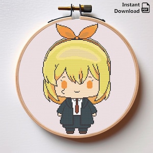 May include: Cross stitch pattern of a cartoon character with yellow hair, a green suit, and an orange bow. The character has a friendly expression and is wearing a red tie.