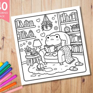 May include: Black and white coloring page featuring a frog reading in a cozy armchair, surrounded by bookshelves, plants, and a lamp. The page is labeled "40 Coloring Page" in a pink banner. Includes a pair of slippers and a blanket.