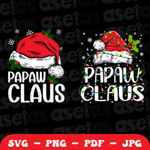 May include: Two Christmas-themed designs on a black background. One features a red Santa hat with the text "PAPAW CLAUS" in white. The other design shows a Santa hat with Christmas lights and the same text. Snowflakes and holly accents are included.