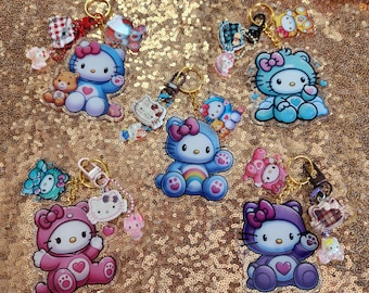 Llavero con traje de oso de Hello Kitty, dije acrílico de Sanrio con extras