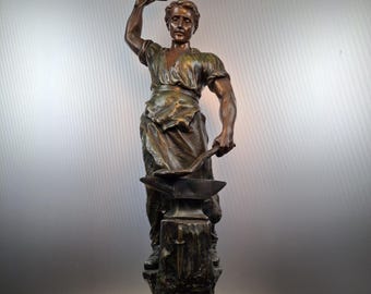 Vintage zamac statue "blacksmith to anvil"