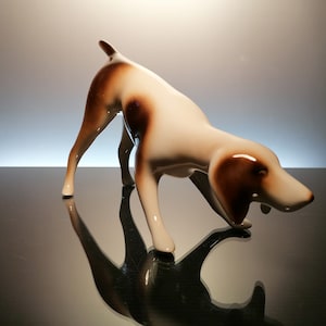 Porcelain hunting dog &quot;Royal Dux&quot;
