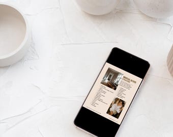 Op de afbeelding: Een smartphone met een "Bridal Suite Checklist" ligt op een wit, getextureerd oppervlak, samen met verschillende witte keramische vazen. Het scherm van de telefoon toont afbeeldingen en tekst met betrekking tot het plannen van een bruiloft.