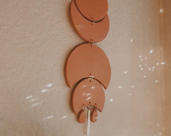 Celeste Clay Moon Phase Wall Hanging: Terracotta & Brass Accent