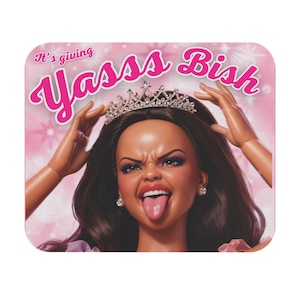 May include: Square pink graphic with a doll-like face sticking out its tongue and wearing a tiara. The text "It's giving Yasss Bish" is written in pink cursive across the top.
