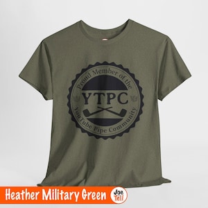 May include: Heather military green t-shirt with a circular graphic. The graphic reads "Proud Member of the YouTube Pipe Community" around a central design of crossed pipes. The shirt's color is described as heather military green.