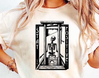 Camiseta de esqueleto con colores cómodos "Mantente positivo"