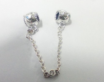 charm con catena di sicurezza a forma di cuori in rilievo in argento sterling 925 pandora