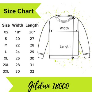 May include: Size chart for a unisex sweatshirt with measurements in inches. The chart shows the width and length of the sweatshirt in sizes XS to 3XL. The brand name Gildan 18000 is displayed at the bottom of the chart.