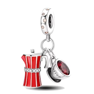 May include: Silver charm with a red and white enamel coffee pot and a red glass cup with the word "coffee" on it.