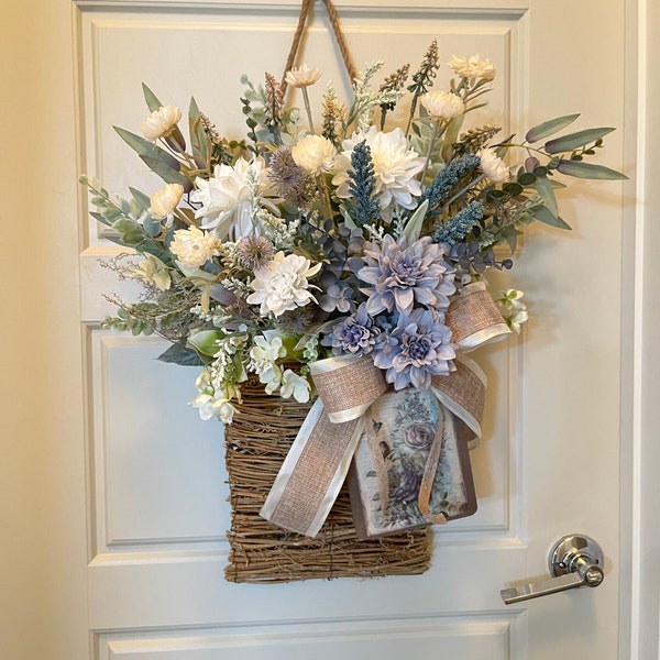 Hanging grapevine basket, blue, mauve, white flowers, farmhouse decor, spring summer wreath, wall hanging, flower arrangement, vintage sign