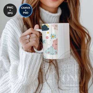 May include: White ceramic mug with a colorful design of clouds and flowers. The mug has a handle and is being held by a person.