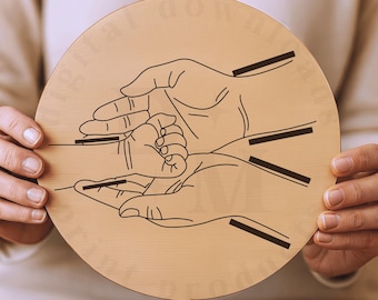 May include: A wooden round plaque with a black line drawing of three hands holding each other. The hands are stylized and represent a family.