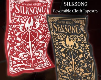 May include: Reversible cloth tapestry featuring the text "Hollow Knight SILKSONG". One side is red with white floral and character designs, the other is black with gold designs. Includes grommets for hanging.