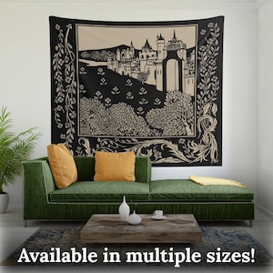 May include: Black and white tapestry featuring a medieval castle with a gate and trees. The castle is surrounded by a decorative border of vines and flowers.