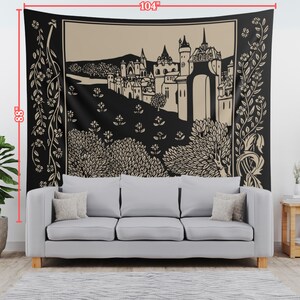 May include: Black and white tapestry featuring a medieval castle with a large archway, surrounded by trees and flowers. The tapestry is 88 inches tall and 104 inches wide.