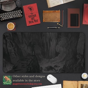 May include: Black and white vintage illustration of a waterfall in a dark, rocky landscape. The illustration is printed on a black mouse mat with the text "Vintage Art Desk Mat" and "Other styles and designs available in the store jungleforestworkshop.etsy.com".