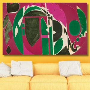 May include: Abstract art print featuring geometric shapes in shades of pink, green, black, and white. The print is framed and hanging on a yellow wall.