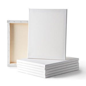 a stack of white cards sitting next to each other