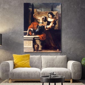 May include: A rectangular wall art print depicting a classical oil painting of a woman in a dark dress interacting with a figure in armor and a red cloak. The scene features a stone pedestal, a dark urn, and a dramatic sky in a dark, moody palette.