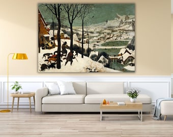 May include: A large rectangular wall art print depicting a winter landscape with hunters and dogs in the foreground, snow-covered houses, and a frozen pond in the distance. The scene features muted tones of white, brown, and dark green under a pale sky.