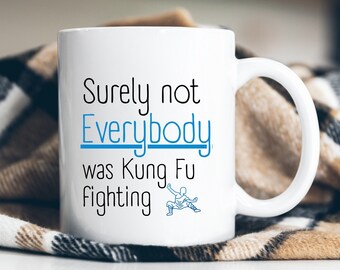 Surely not everybody was Kung Fu fighting white/black/blue coffee mug